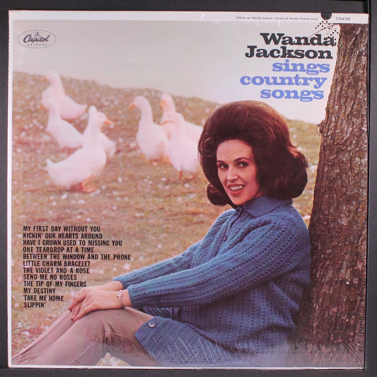 sings country songs by WANDA JACKSON