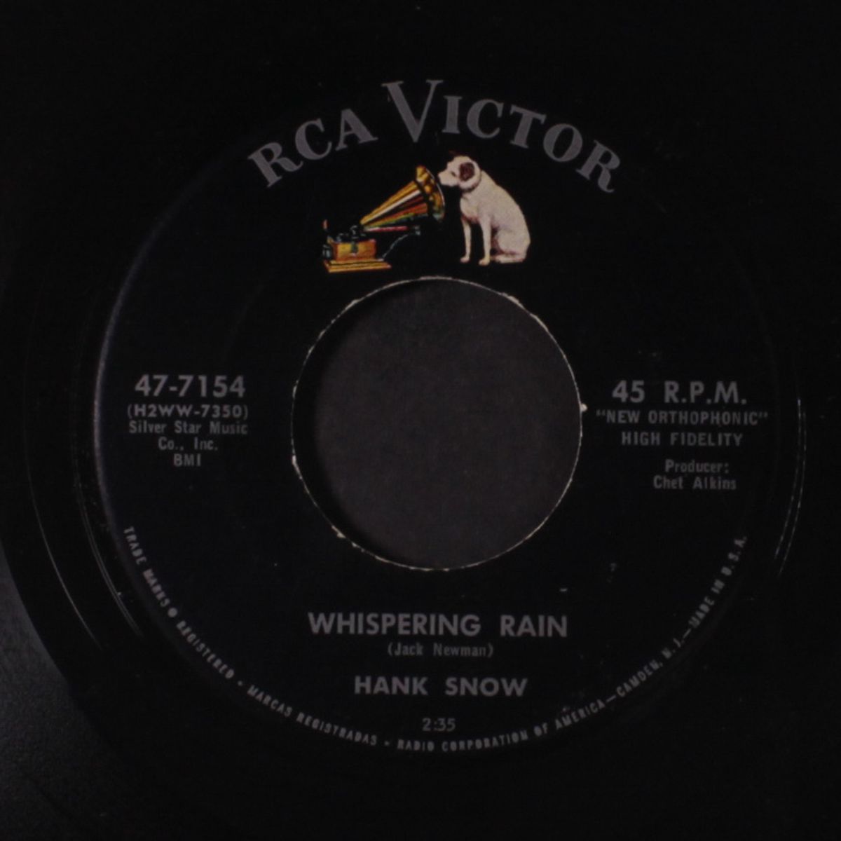 whispering rain by HANK SNOW