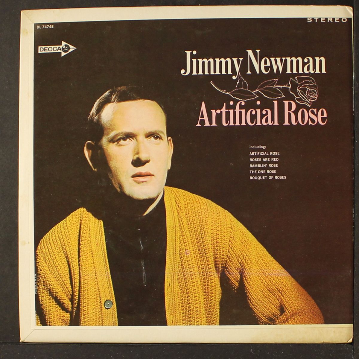 artificial rose by JIMMY NEWMAN