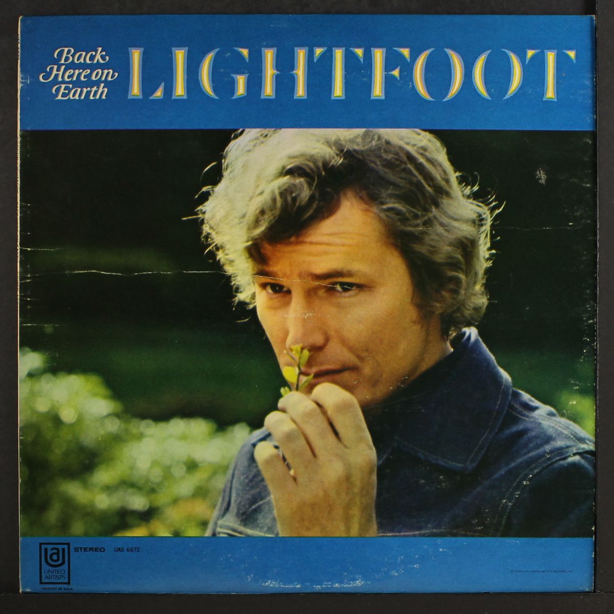 back here on earth by GORDON LIGHTFOOT