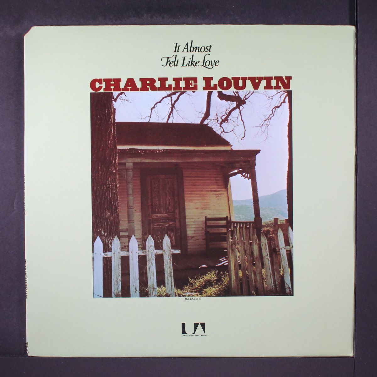 it almost felt like love by CHARLIE LOUVIN