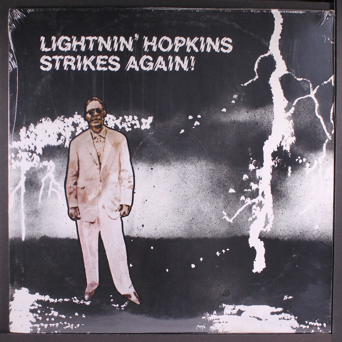 strikes again by LIGHTNIN' HOPKINS