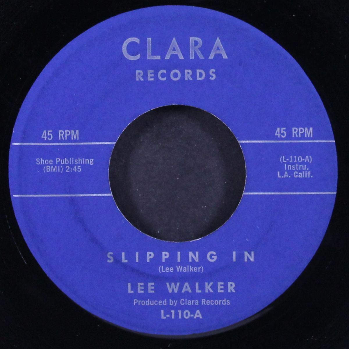 cold sand / slipping in by LEE WALKER