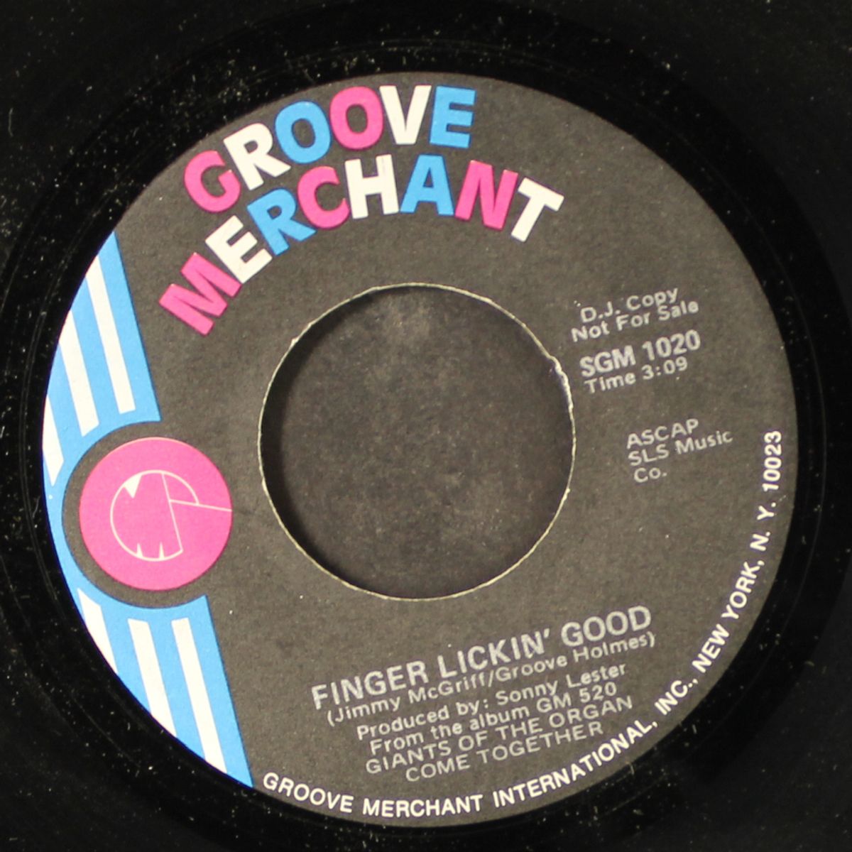 the squirrel / finger lickin' good by JIMMY MCGRIFF & GROOVE HOLMES