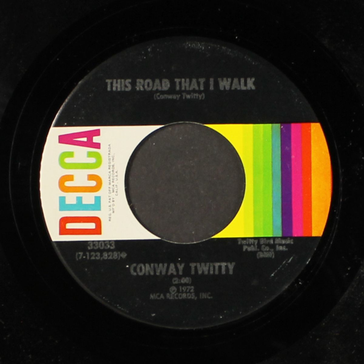 she needs someone to hold her by CONWAY TWITTY