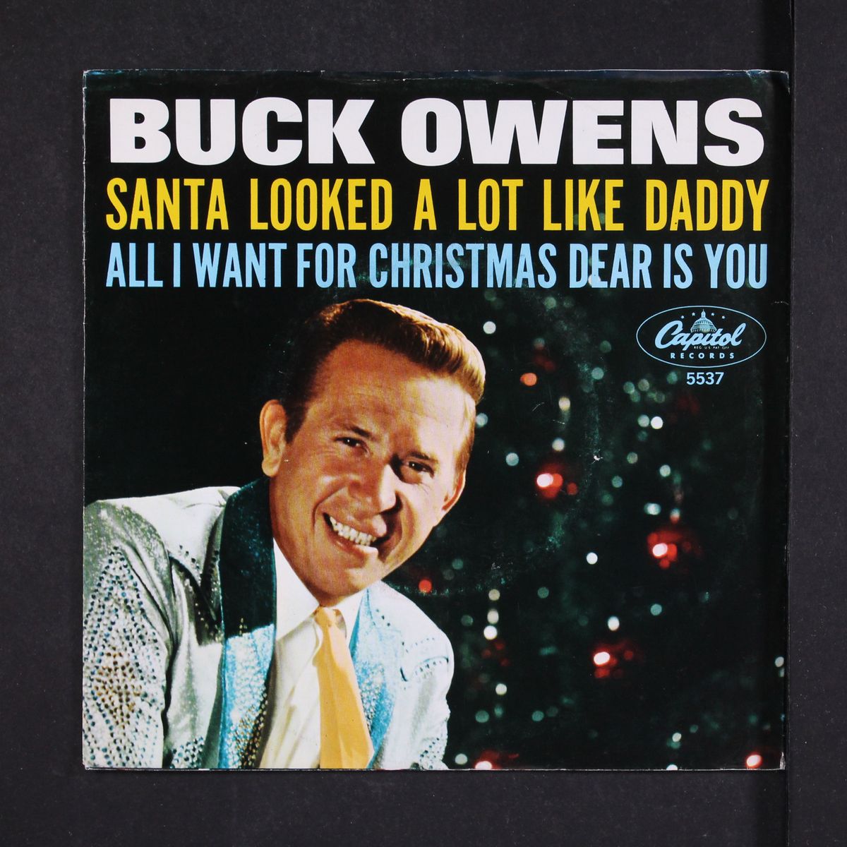 santa looked a lot like daddy by BUCK OWENS
