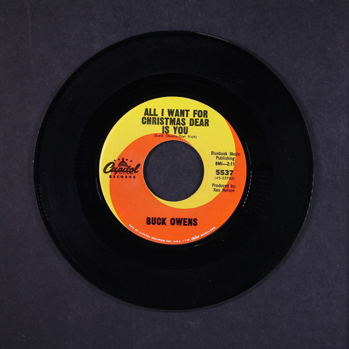 santa looked a lot like daddy by BUCK OWENS