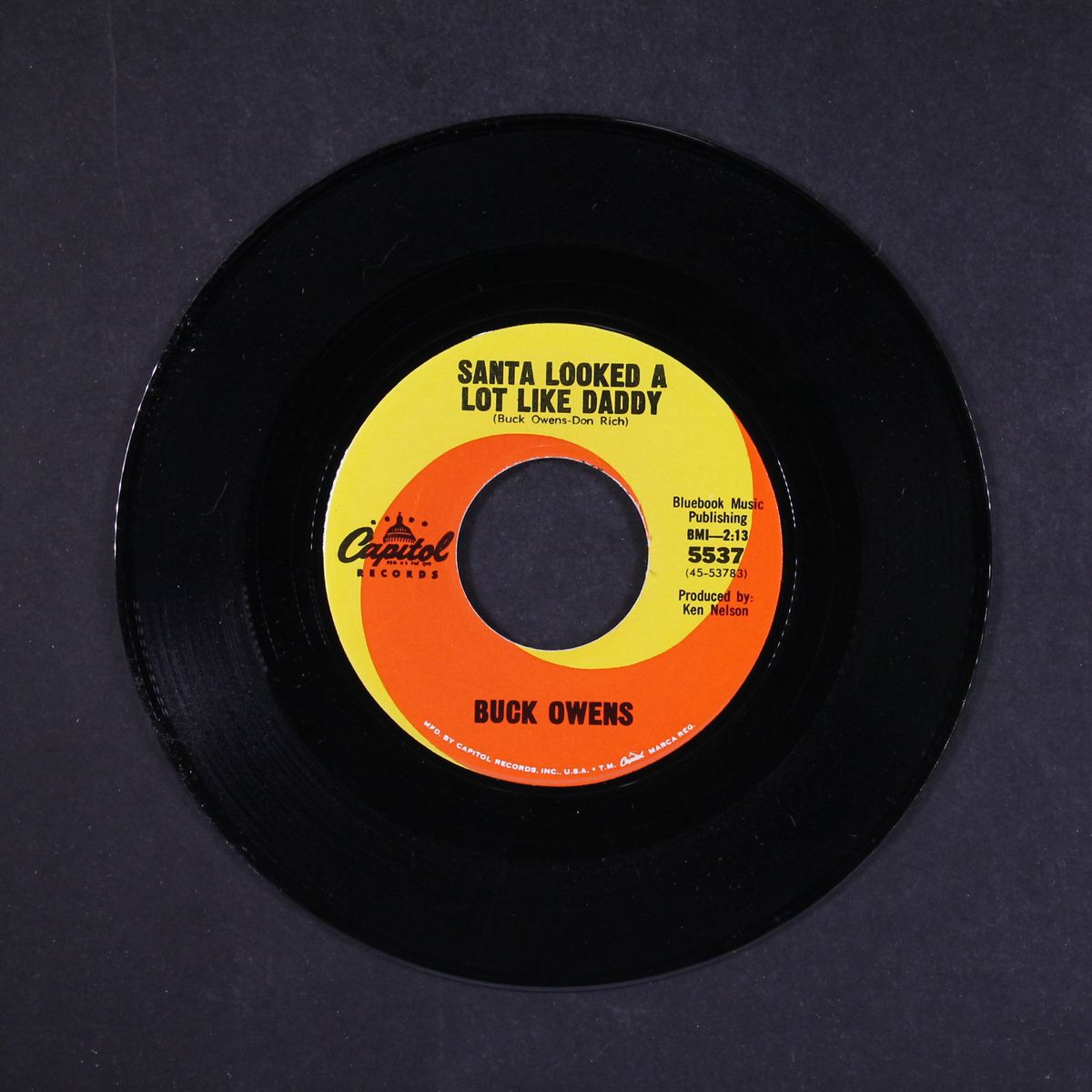 santa looked a lot like daddy by BUCK OWENS