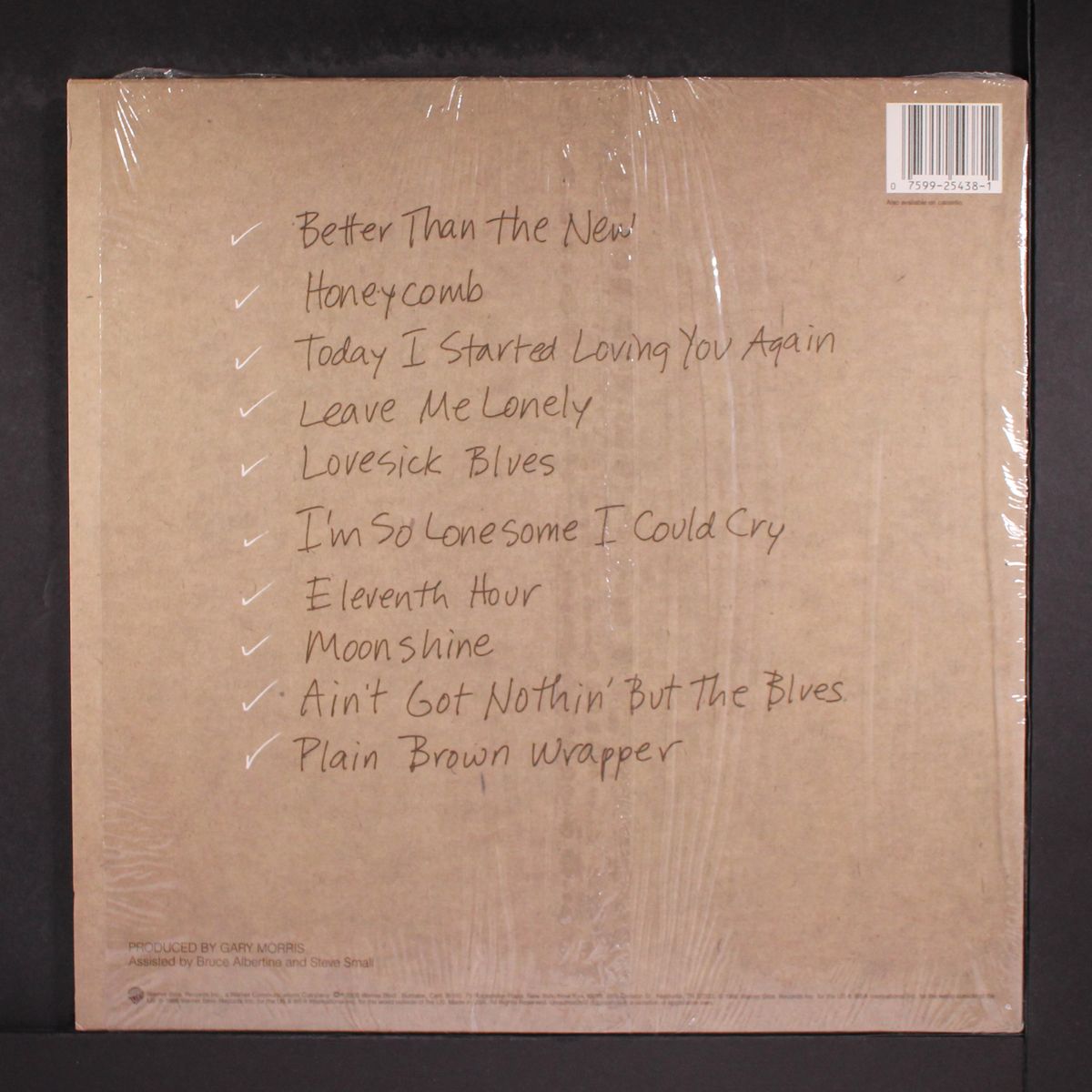 plain brown wrapper by GARY MORRIS