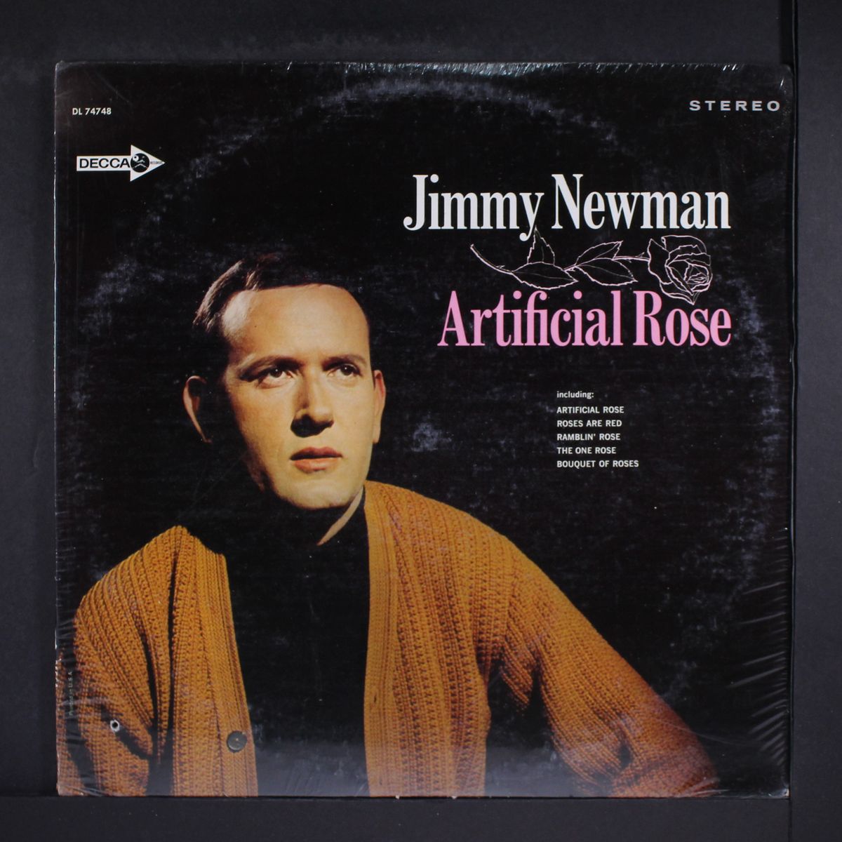 artificial rose by JIMMY NEWMAN