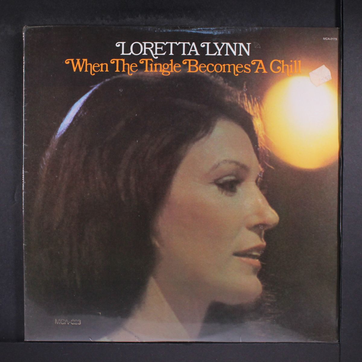 when the tingle becomes a chill by LORETTA LYNN