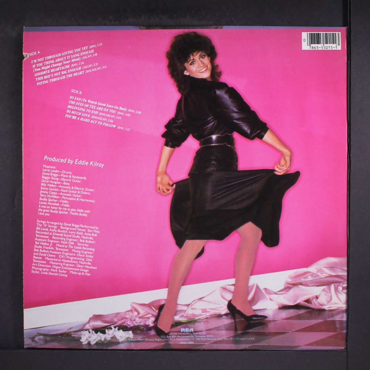 i'm not through loving you yet by LOUISE MANDRELL