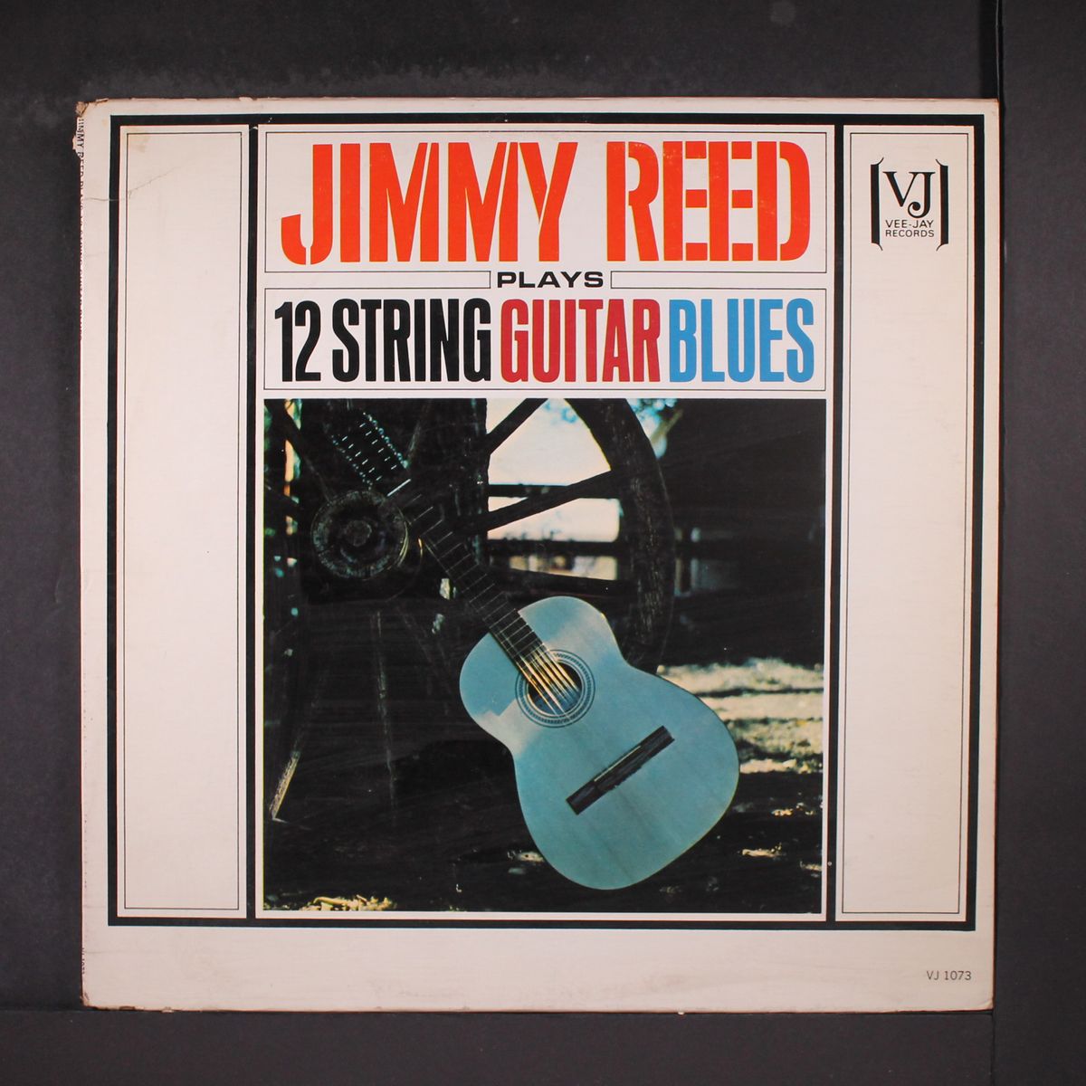 plays 12 string guitar blues by JIMMY REED