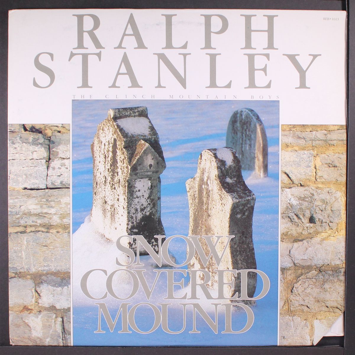 snow covered mound by RALPH STANLEY