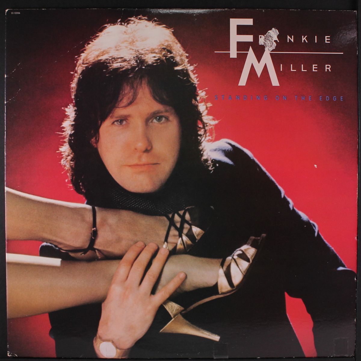 standing on the edge by FRANKIE MILLER