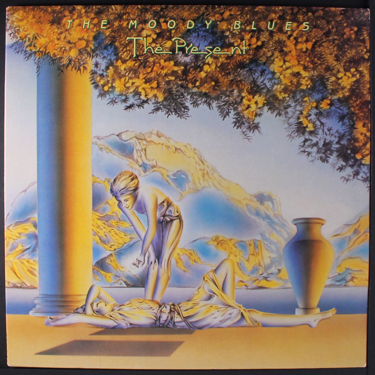 the present by MOODY BLUES