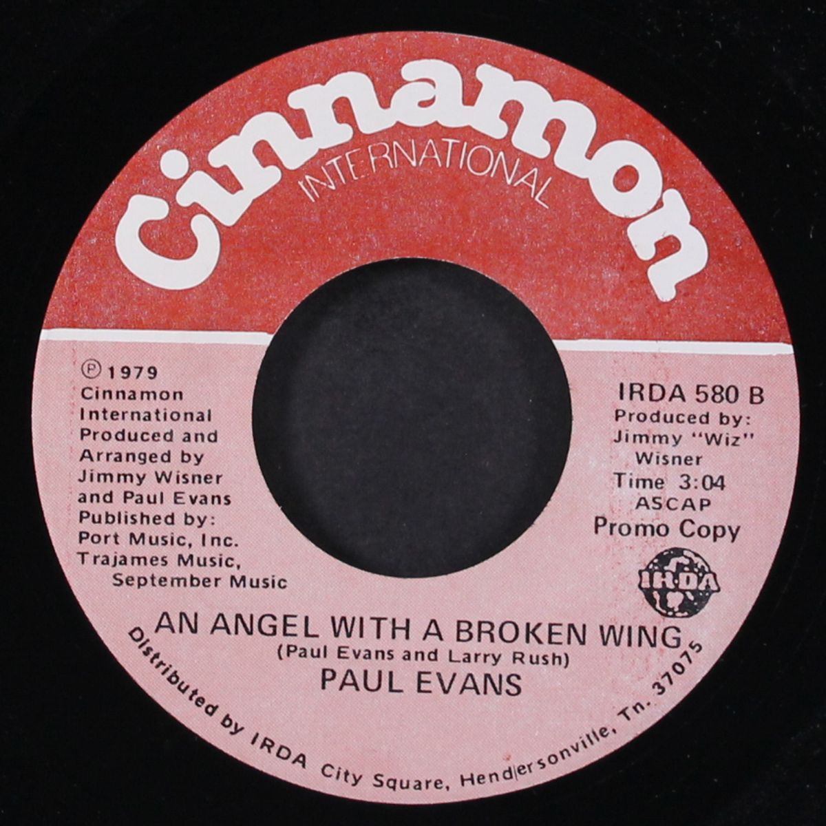 good neighbor / an angel with a broken wing by PAUL EVANS