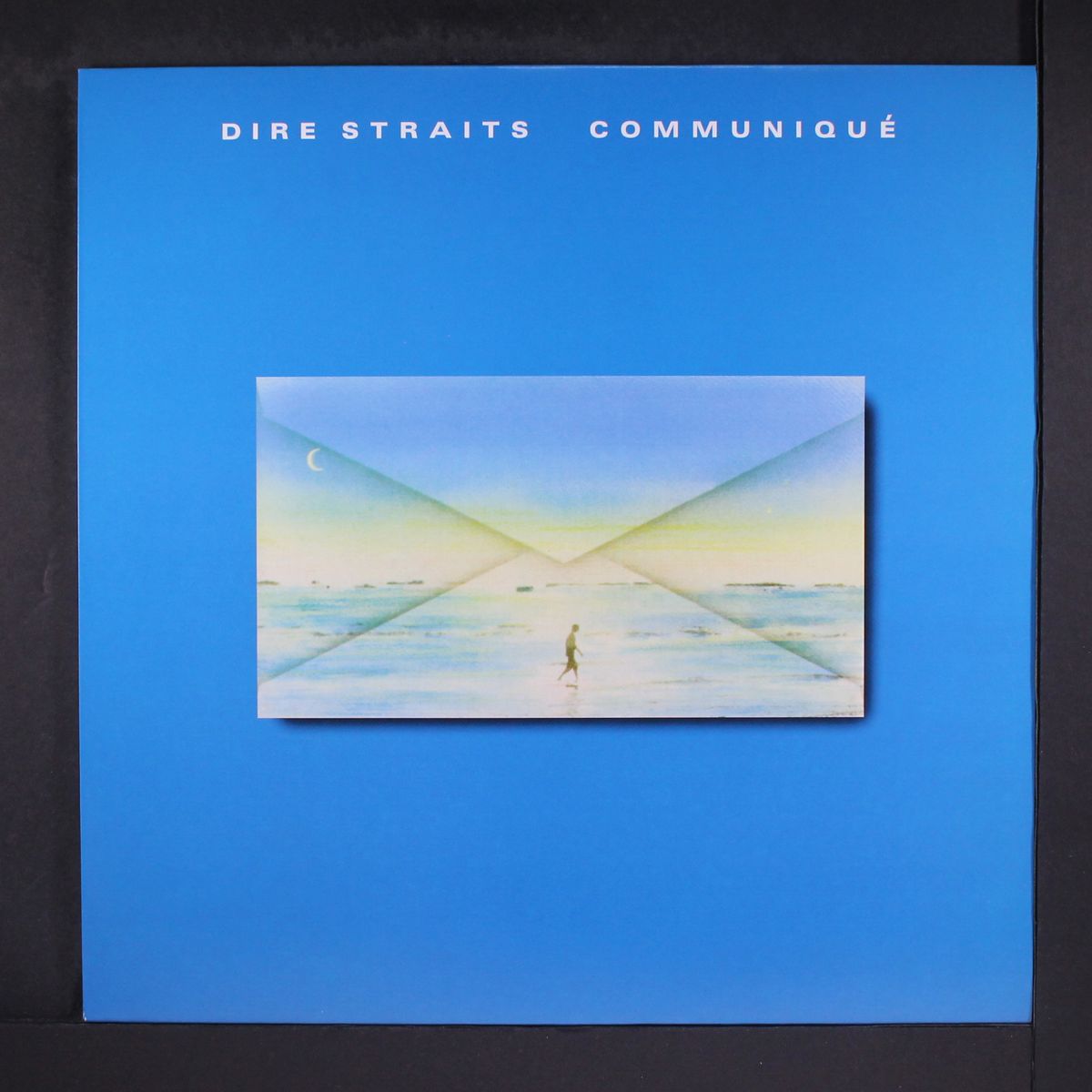 communique by DIRE STRAITS