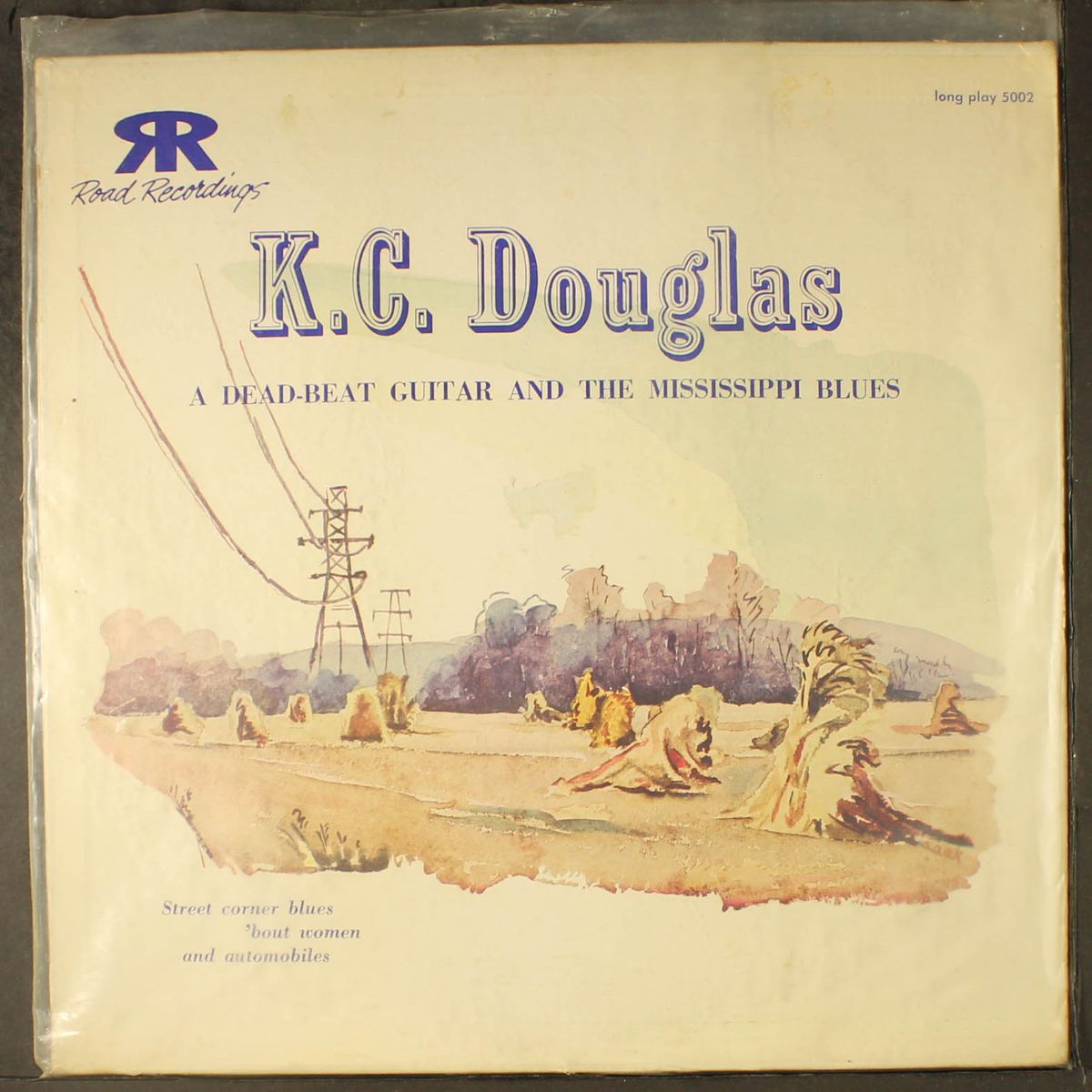 a dead beat guitar and the mississippi blues by K.C. DOUGLAS