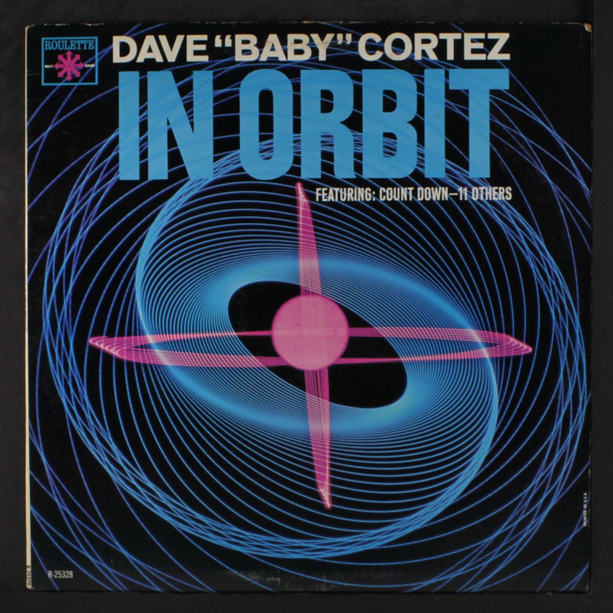 in orbit by DAVE 'BABY' CORTEZ