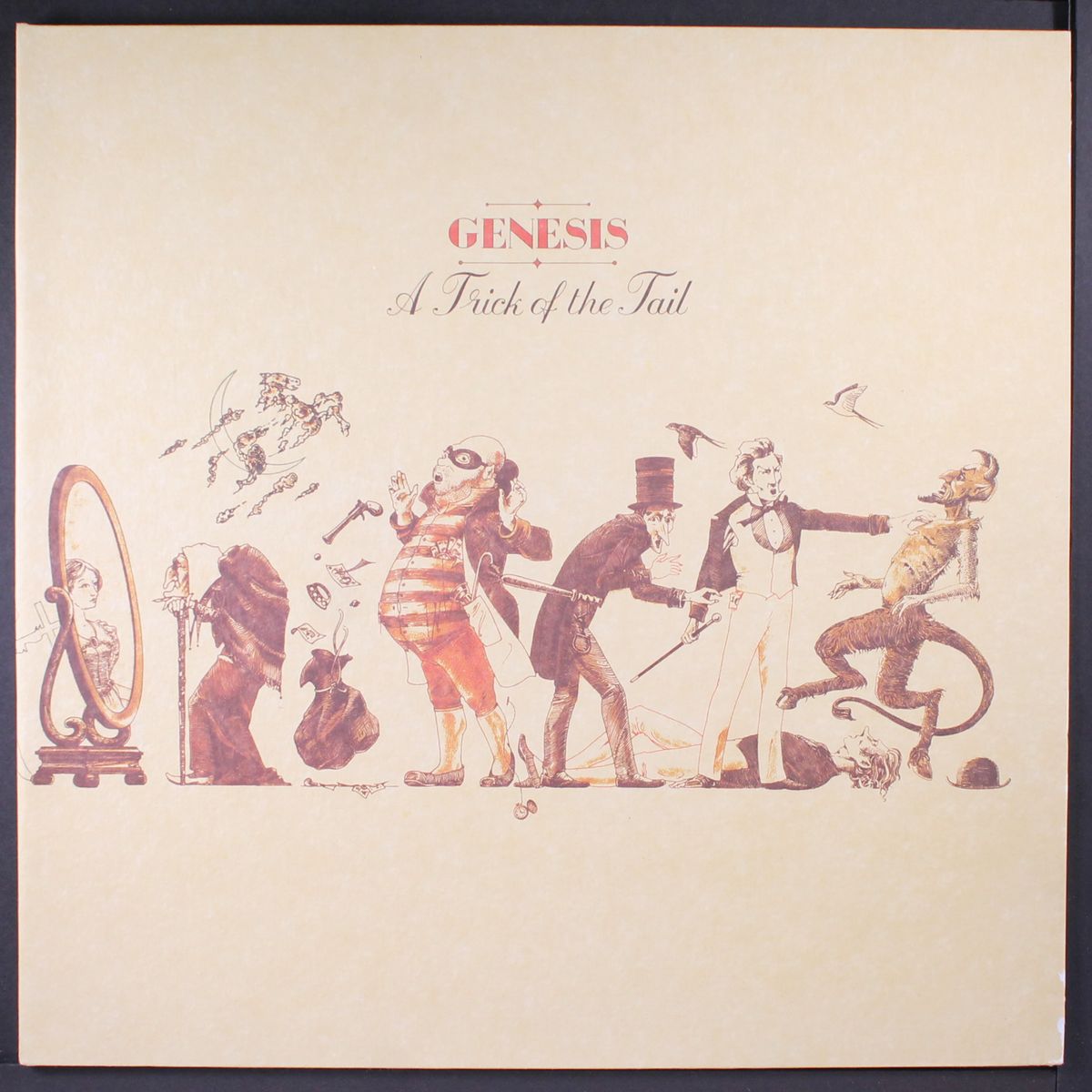 a trick of the tail by GENESIS