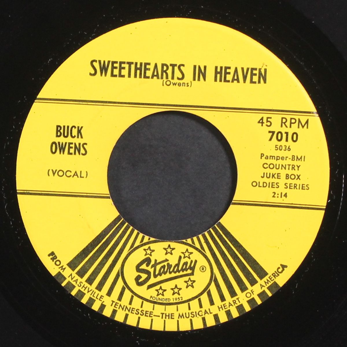down on the corner of love by BUCK OWENS