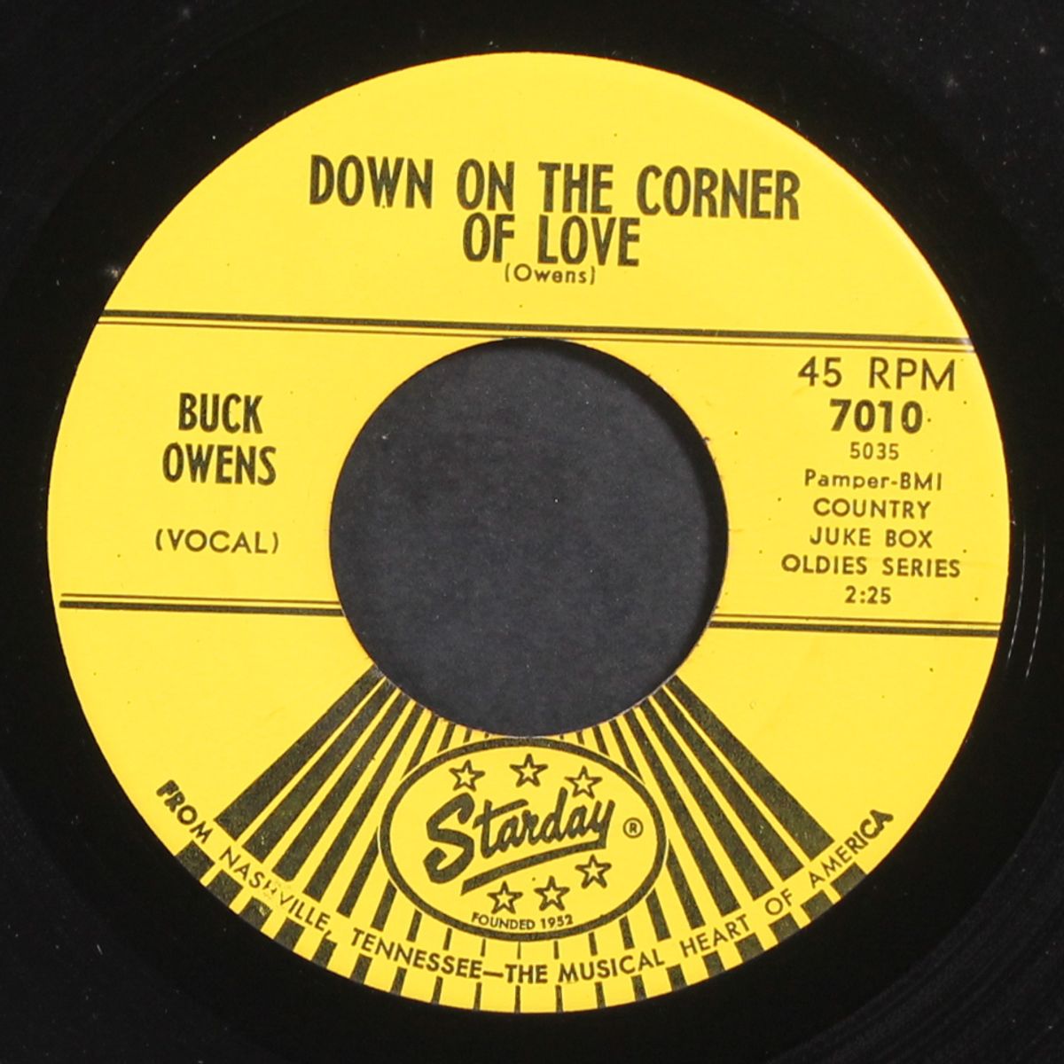down on the corner of love by BUCK OWENS