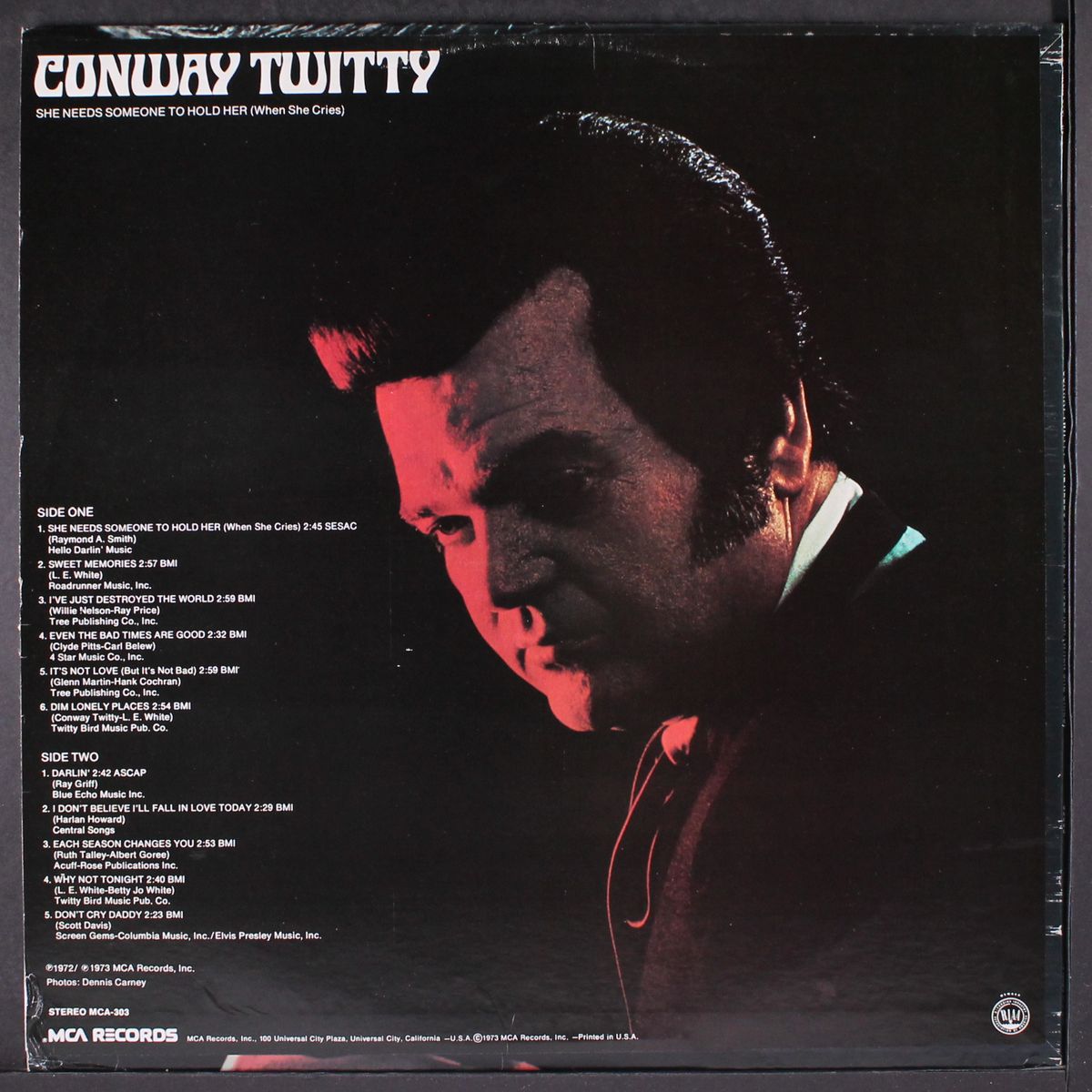 she needs someone to hold her by CONWAY TWITTY