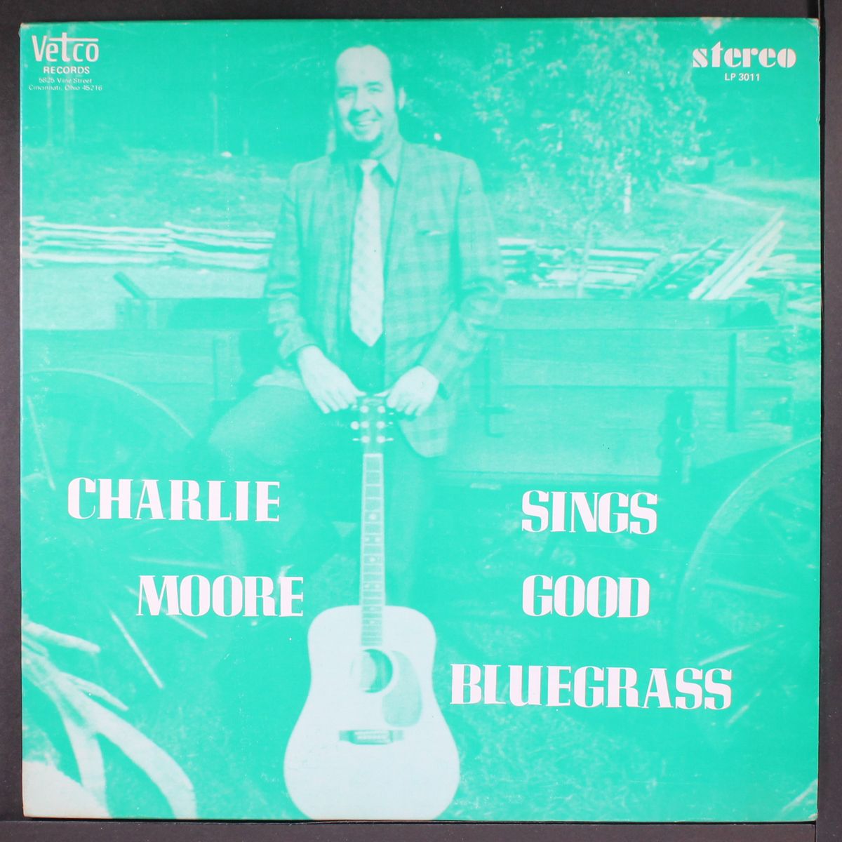 sings good bluegrass by CHARLIE MOORE