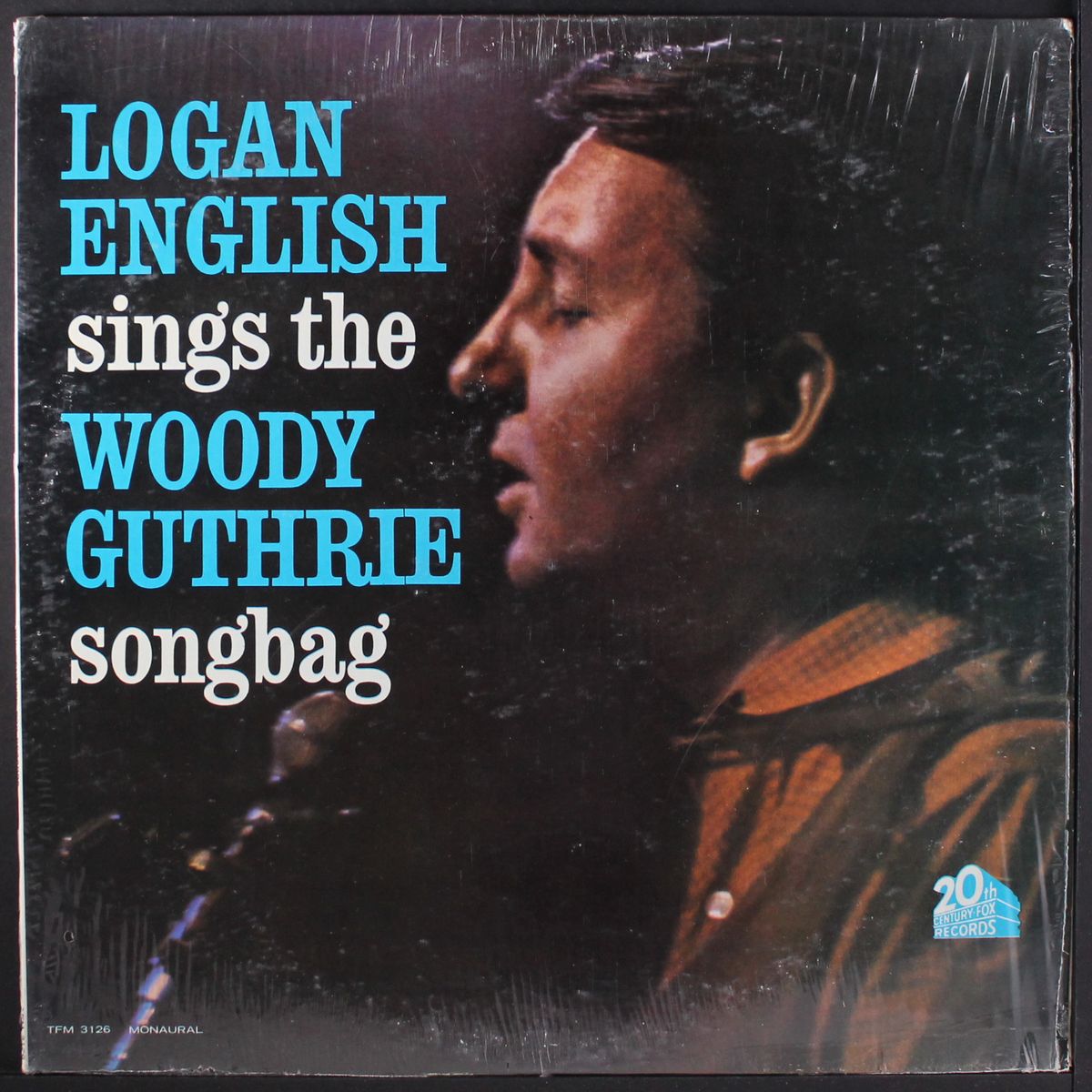 sings the woody guthrie songbag by LOGAN ENGLISH