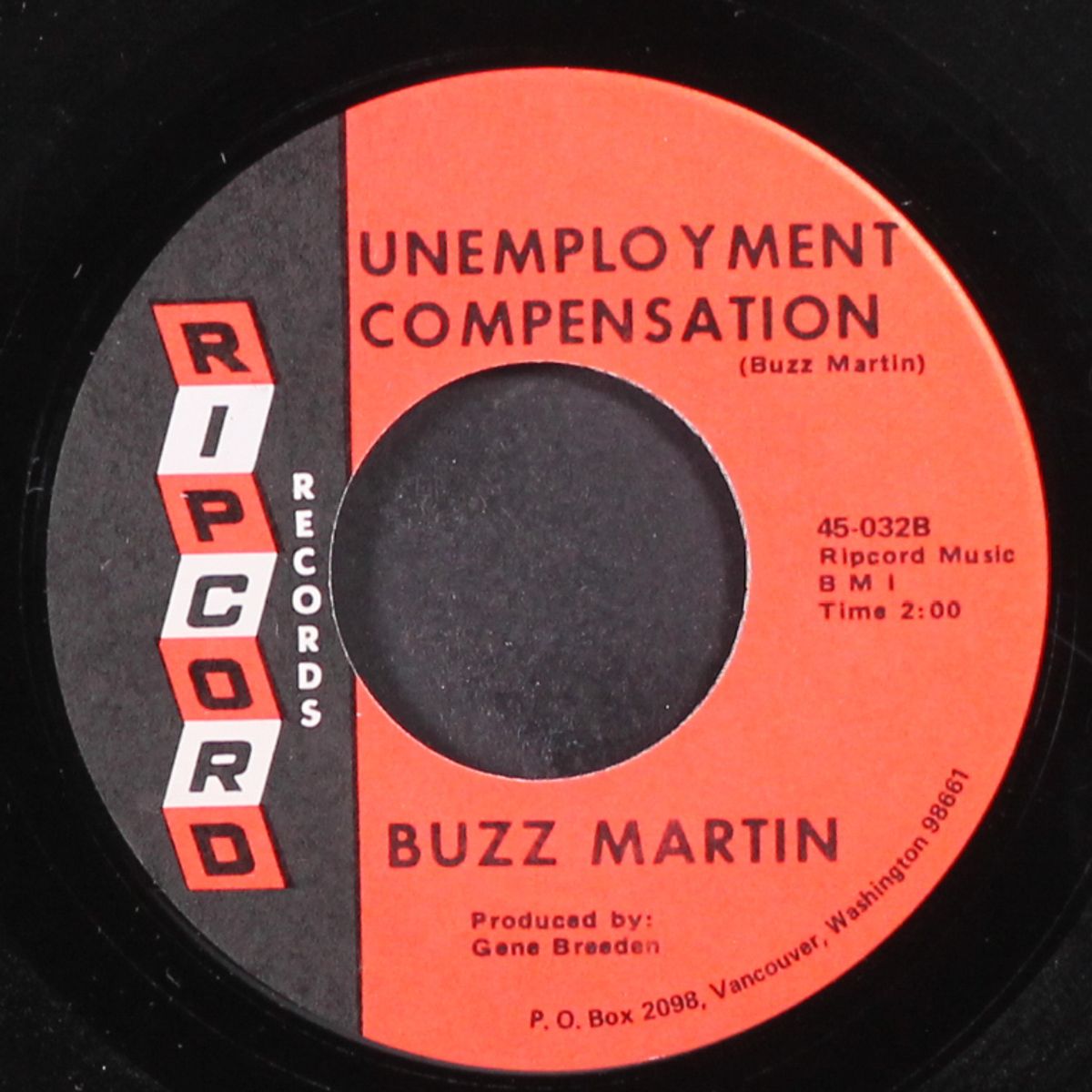 the man at the top / unemployment compensation by BUZZ MARTIN