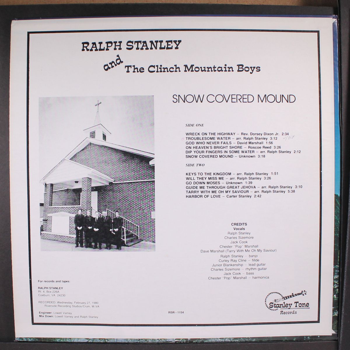 snow covered mound by RALPH STANLEY