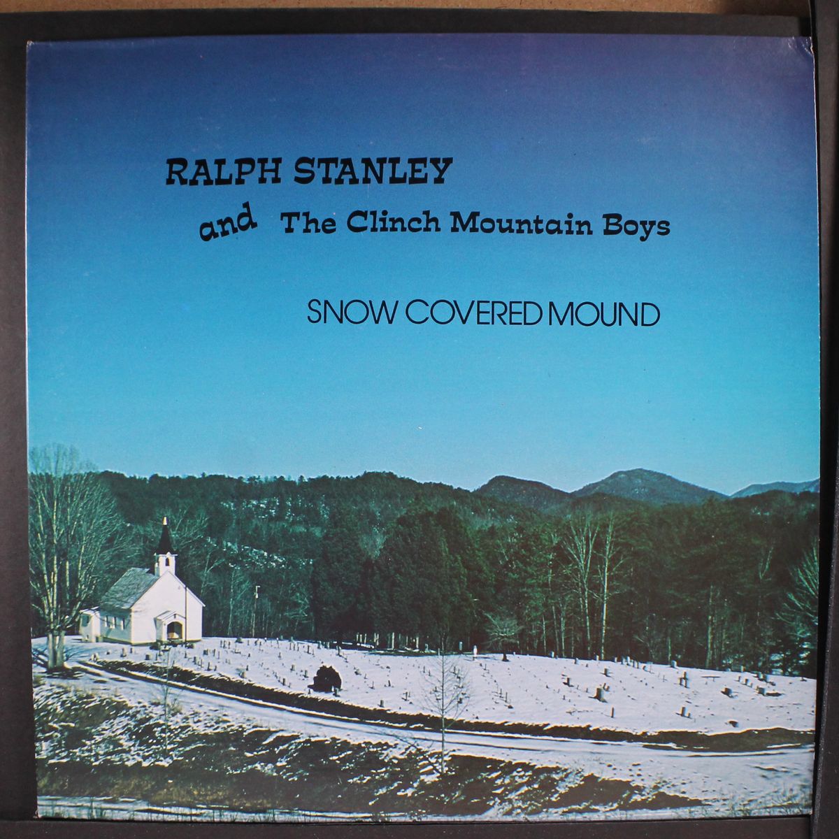 snow covered mound by RALPH STANLEY