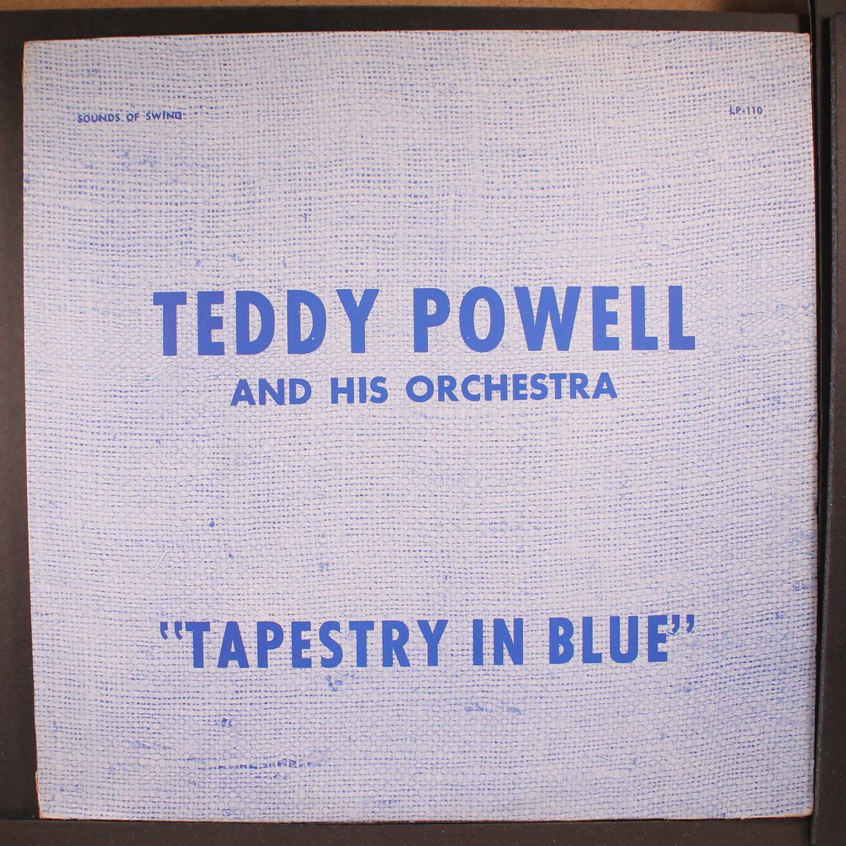 tapestry in blue by TEDDY POWELL