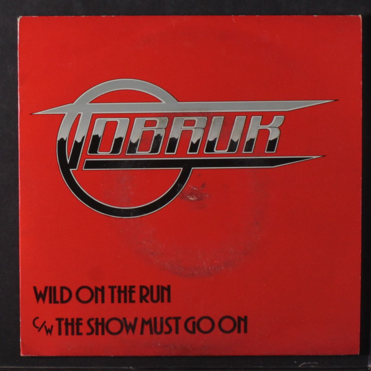wild on the run / the show must go on by TOBRUK