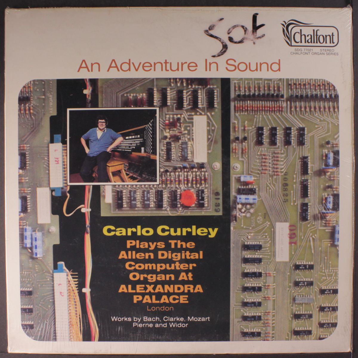 plays the allen digital computer organ at alexandra palace by CARLO CURLEY