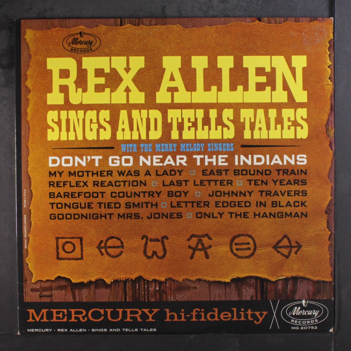 sings and tells tales by REX ALLEN