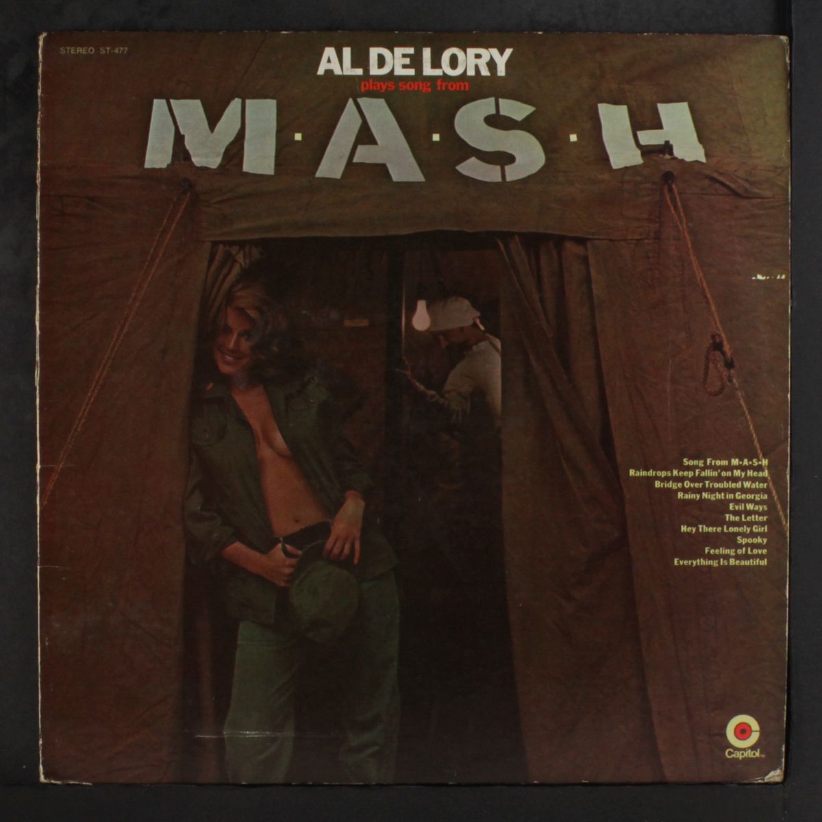 plays song from m*a*s*h by AL DE LORY