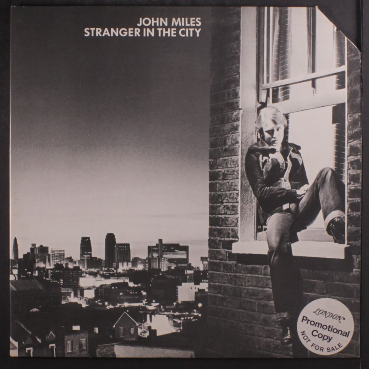 stranger in the city by JOHN MILES
