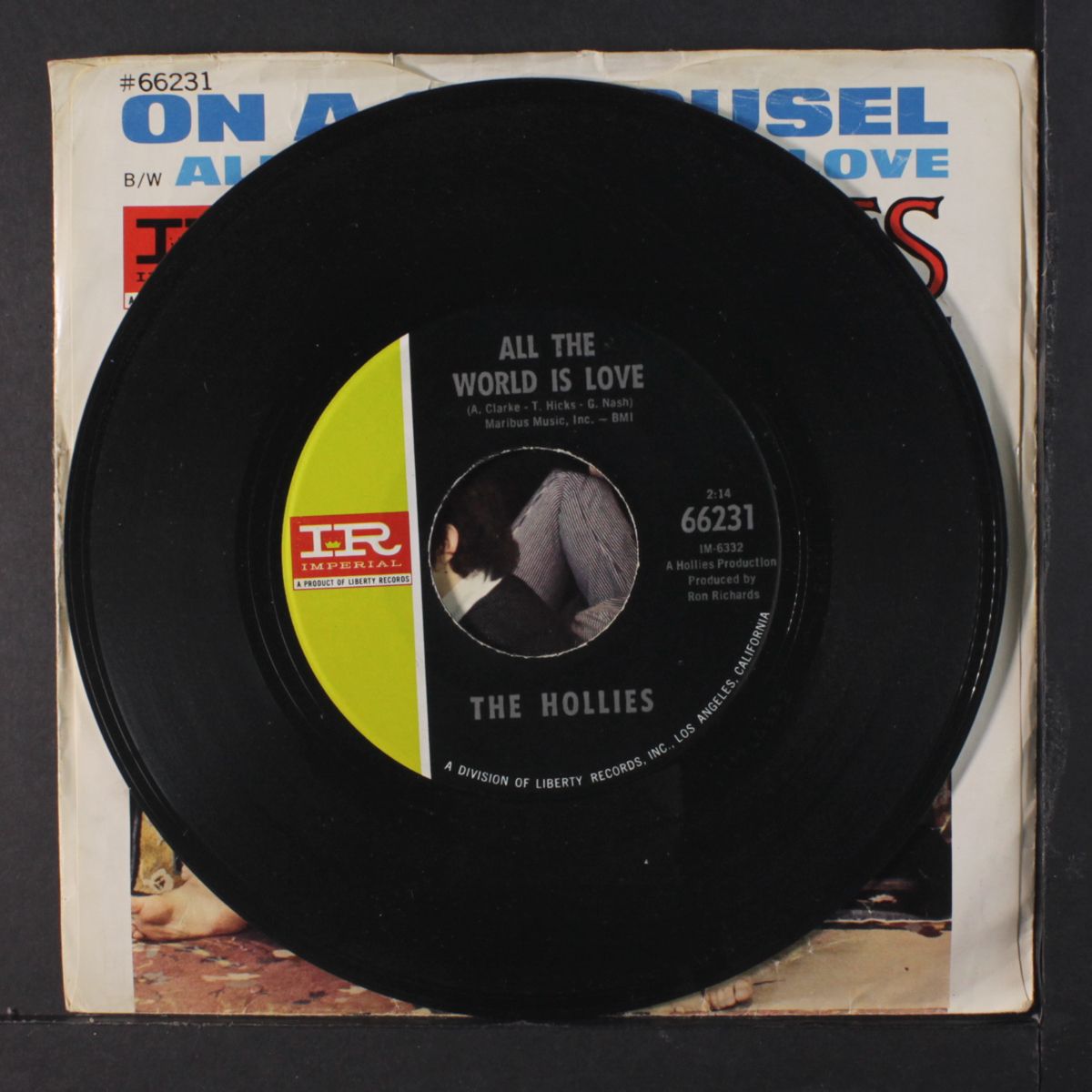 on a carousel / all the world is love by HOLLIES