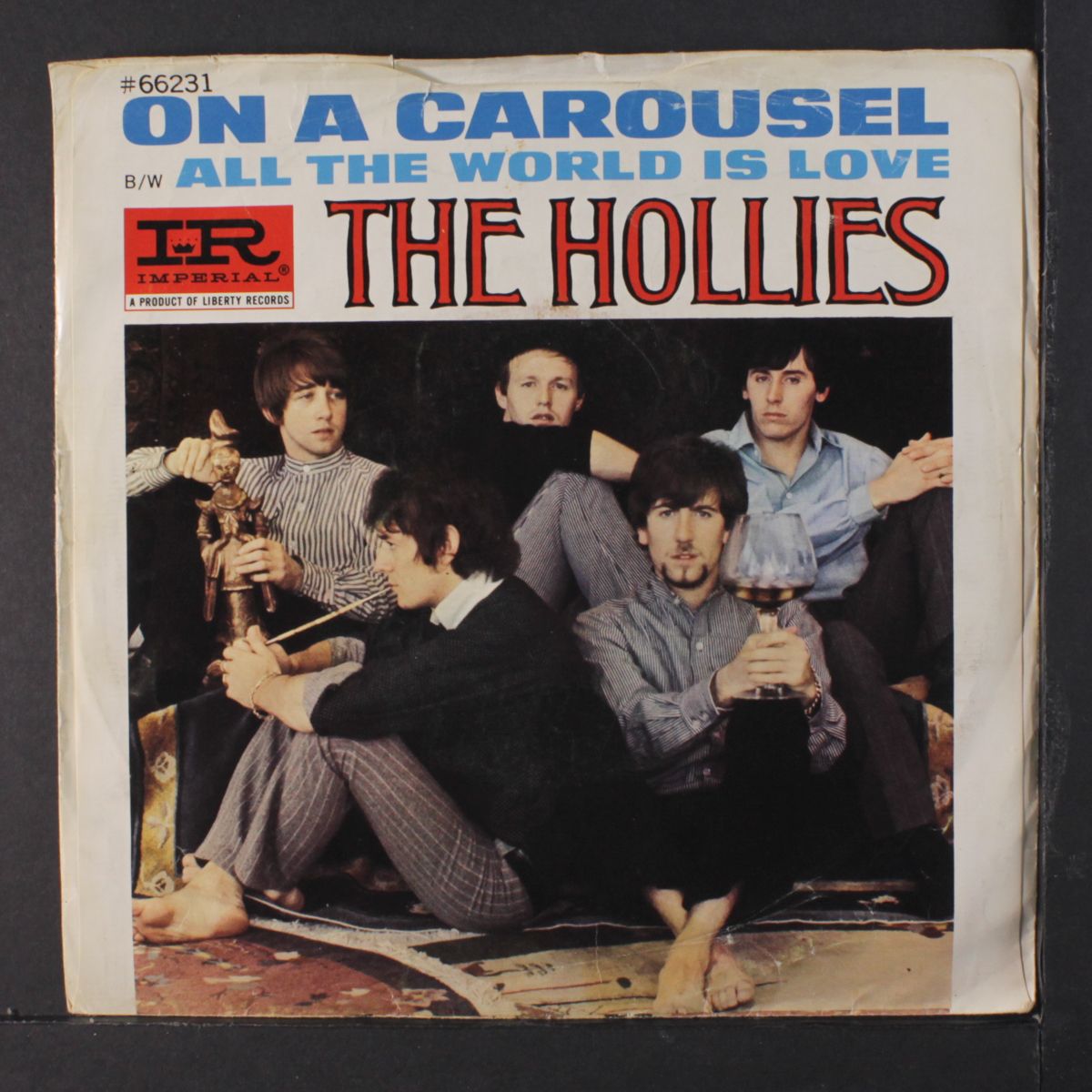 on a carousel / all the world is love by HOLLIES