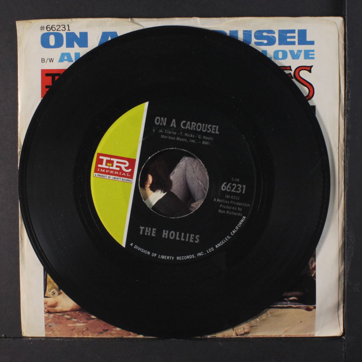 on a carousel / all the world is love by HOLLIES
