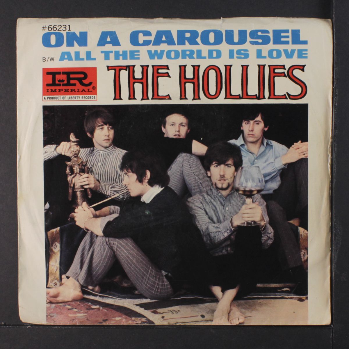 on a carousel / all the world is love by HOLLIES