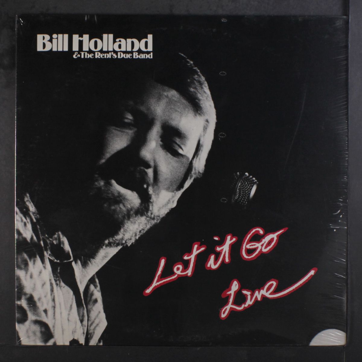 let it go, live by BILL HOLLAND