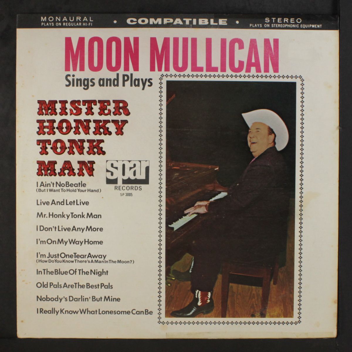 sings and plays by MOON MULLICAN