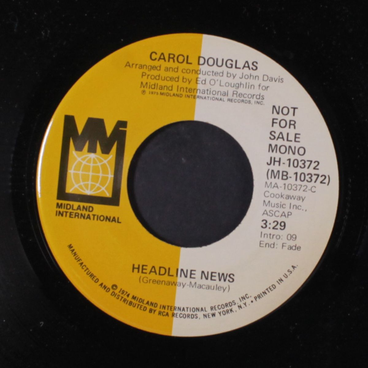 headline news / mono by CAROL DOUGLAS