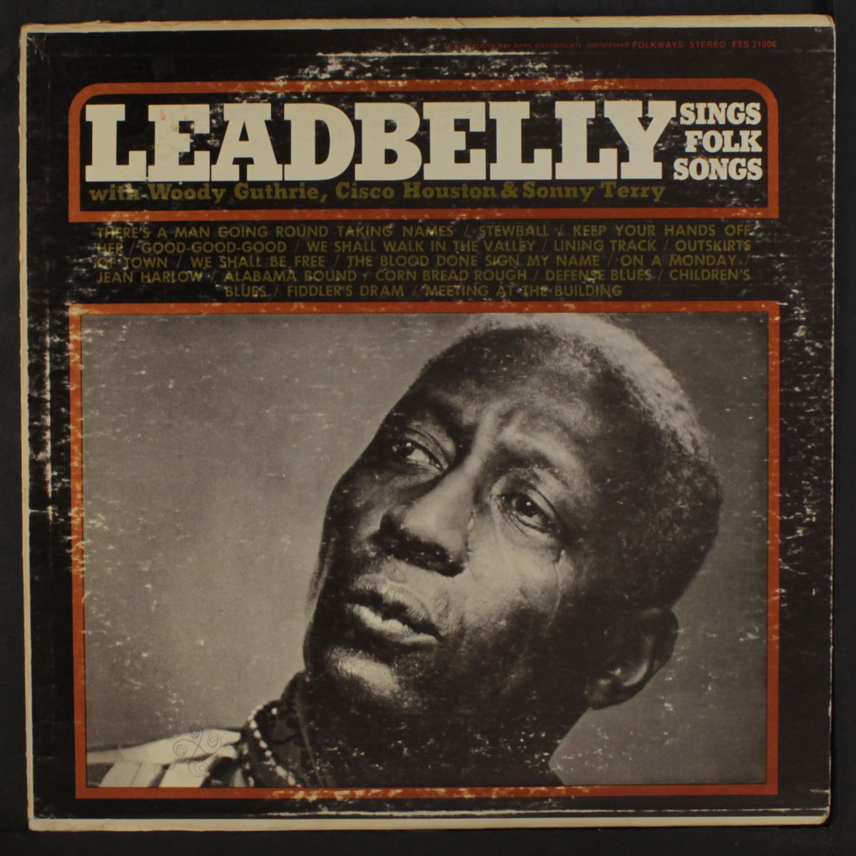 sings folk songs by LEADBELLY