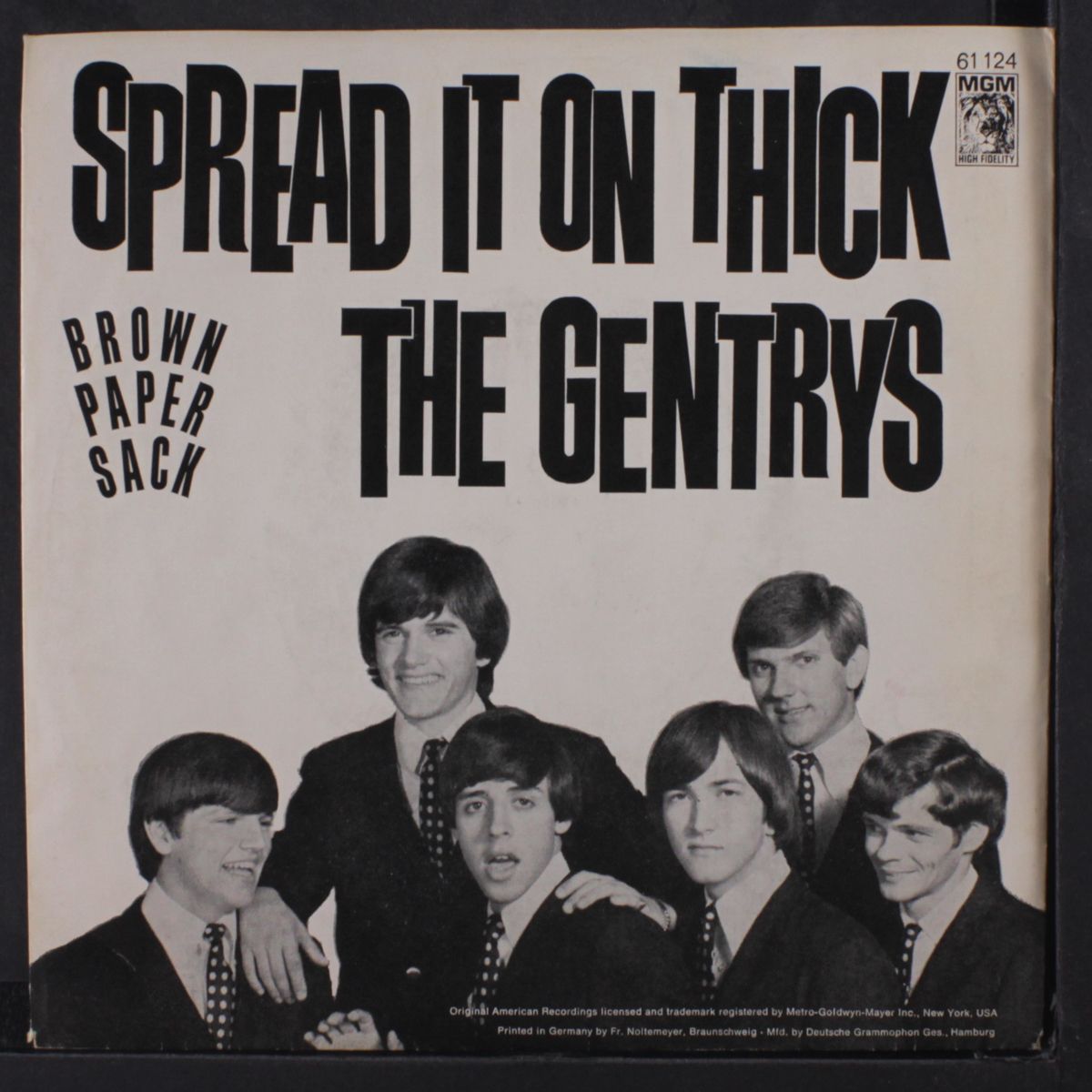 spread it on thick / brown paper sack by GENTRYS