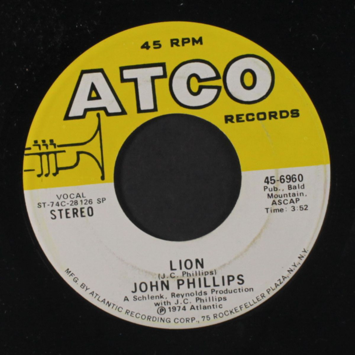 green-eyed lady / lion by JOHN PHILLIPS