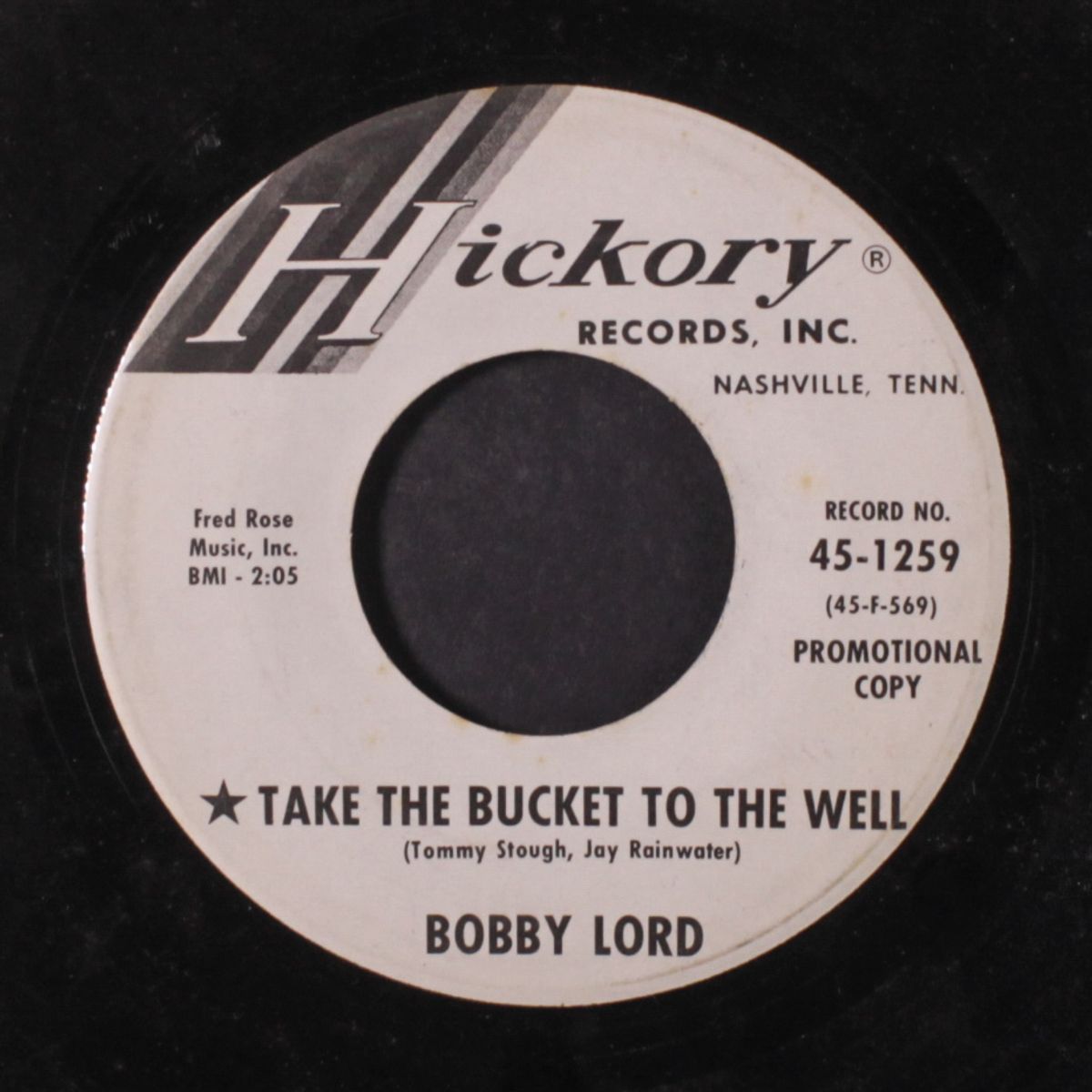 a man needs a woman / take the bucket to the well by BOBBY LORD